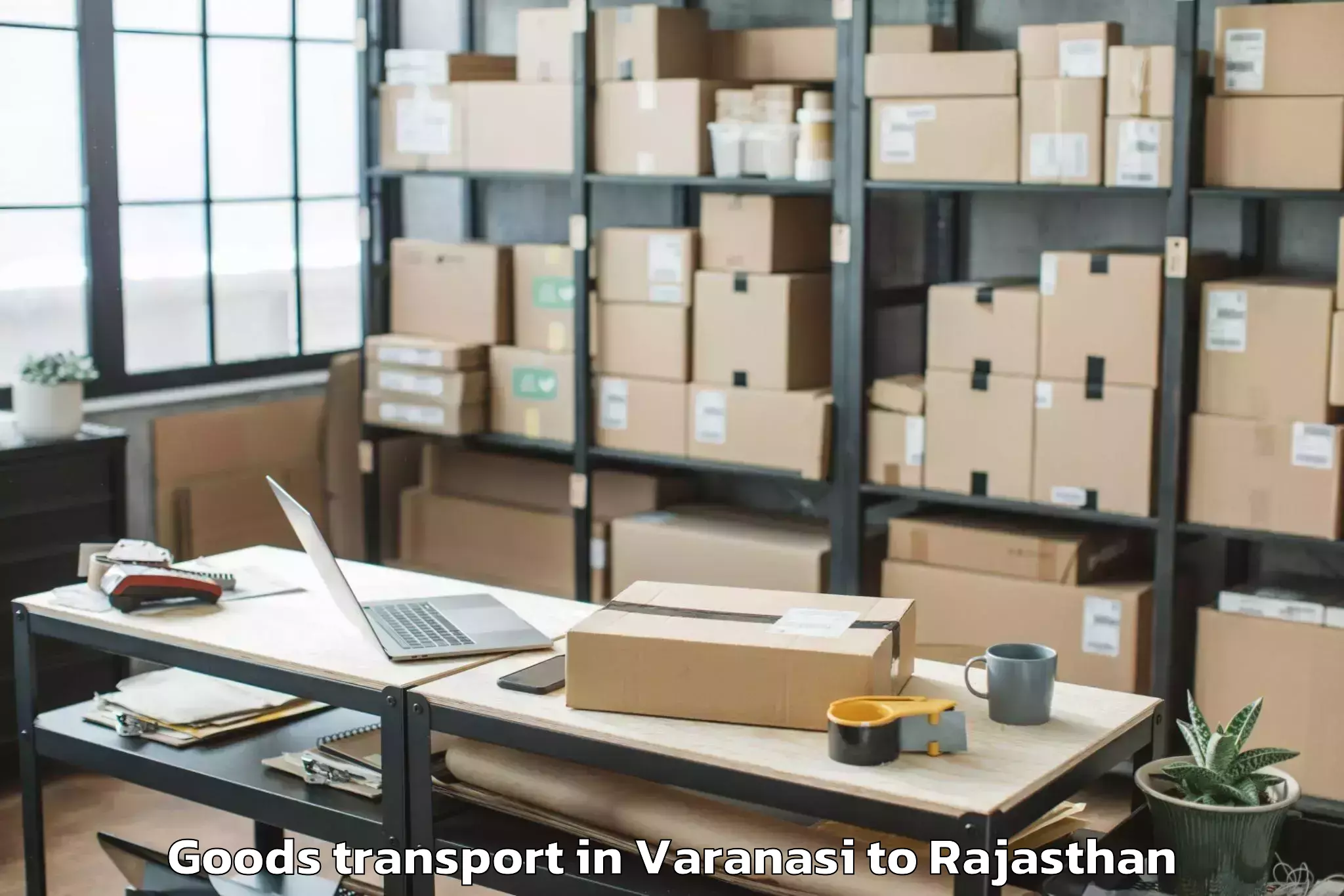 Varanasi to Kherwara Goods Transport Booking